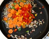 A picture of step 4 of Thai Pineapple Fried Rice.