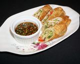 A picture of step 10 of Shrimp and Shiitake Spring Rolls.