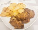 Hagymás tepsis tarja velesült krumplival recept fázis 3 fotója
