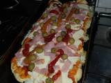 Pizza súper práctica en la plancheta
