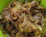 A picture of step 7 of Ragi mudda with mutton curry.
