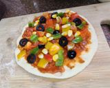 A picture of step 10 of Jain Cheese burst pizza.