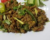 A picture of step 10 of Qeema Hari Mirch.