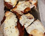 A picture of step 5 of Less saucy chicken Parmesan.
