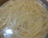 Foto del passaggio 5 della ricetta Linguine al tonno "capricciose"