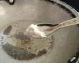 A picture of step 11 of Fafada-Kadhi with Grated Raw Papaya.