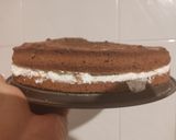 Foto del paso 5 de la receta: Pastel relleno nata y cubierto con dos chocolates