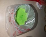 A picture of step 3 of Kiwi swiss roll cake.