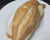 Foto del paso 5 de la receta: Bocadillo de lomo adobado con pimiento del piquillo, tortilla y queso