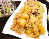 A picture of step 7 of Aloo Matar Chawal.