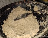A picture of step 1 of Wheat and Coconut Ladoo.