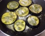 A picture of step 5 of Baingan bhaja.