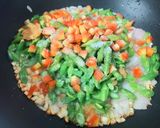 A picture of step 2 of Indo Chinese Shrimp Fried Rice.