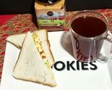 A picture of step 4 of Cheesy Scrambled Egg Sandwich With Black Tea.