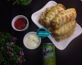 A picture of step 4 of Sausage rolls.