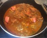 A picture of step 10 of Kerala chicken curry.