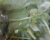 A picture of step 1 of Sarson Ka Saag and Makki Ki Roti.