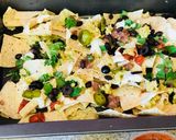 A picture of step 2 of # Football seasonLoaded Nachos.