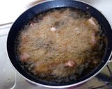 A picture of step 4 of Deep fried beef.