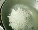 A picture of step 3 of Khichi rice flowers balls.