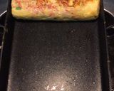 A picture of step 4 of Japanese style egg roll (crab stick with salad dressing).