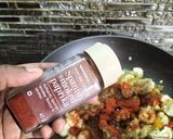 A picture of step 3 of Cauliflower chakalaka.