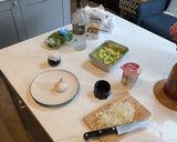 A picture of step 1 of Pasta alla vodka, with pork and sprouts.