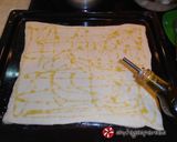 Φωτογραφία βήματος 17 της συνταγής “Carrot Pizza”, με gouda και κόκκινο κρεμμύδι