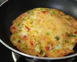 A picture of step 11 of Rice Cheela.