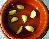 Foto del paso 9 de la receta: Cigalitas y ajos macerados en aceite de oliva confitados