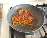 A picture of step 3 of Fusilloni with Datterini Tomato Purée, Shrimp, Mini Peppers, and Walnuts.