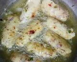 A picture of step 5 of Poha ke lolipop.