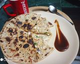 A picture of step 4 of Paneer parantha.