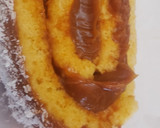 Foto del paso 7 de la receta: Arrollado de dulce de leche y coco