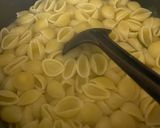 A picture of step 1 of Easy stuffed shells (pasta bake) spinach mushrooms and ricotta cheese.