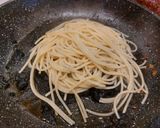 A picture of step 3 of Spaghetti with Squid Ink, Clams, and Pistachios.