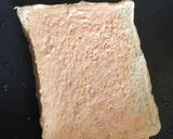 A picture of step 3 of Cheesy egg toast.