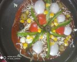 A picture of step 7 of Thin Crust Ragi Pizza.