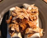 A picture of step 4 of STEAK and SHREDDED CHICKEN BURRITOS WITH MELTED CHEESE/FRITOS: JAYS SMOTHERED BURRITO.