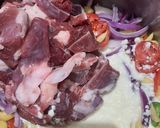 A picture of step 1 of Aloo gosht.