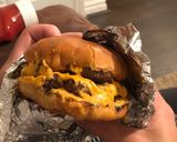 A picture of step 8 of A gooey, naughty, cheeseburger.