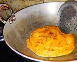 A picture of step 5 of Dibba roti or meenapa roti.