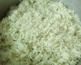 A picture of step 5 of Chicken flavored simple rice.