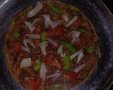 A picture of step 4 of Paratha Pizza.