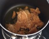 A picture of step 2 of Almond, sesame and jaggery fudge (badam gur papadi).