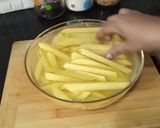 A picture of step 1 of Crispy honey chilli potato.