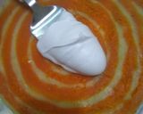 A picture of step 11 of Orange Marble Swiss Roll.