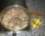 Foto del paso 4 de la receta: Arroz caldoso con pollito al ajillo
