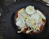 A picture of step 3 of Ragi flour pizza.