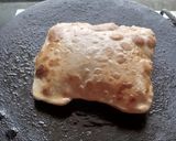 A picture of step 5 of Qeema paratha.